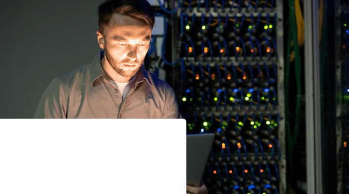 Managed IT services member working on a computer